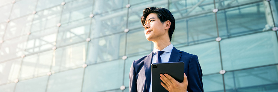 Business person holding a tablet computer